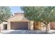 Charming single-Gathering home featuring a two-car garage, low maintenance desert landscaping, and a terracotta tile roof at 2542 W Gaby Rd, Phoenix, AZ 85041