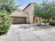 Charming single-Gathering home featuring stucco siding, a two-car garage, and well-maintained landscaping at 2542 W Gaby Rd, Phoenix, AZ 85041