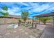 Spacious backyard with desert landscaping, a pergola, and a block wall at 2845 N 104Th Ave, Avondale, AZ 85392
