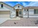 Inviting single-level home with a neutral exterior and a convenient two-car garage at 2845 N 104Th Ave, Avondale, AZ 85392