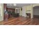 Spacious kitchen featuring a central island with granite counter, wooden cabinets, and open layout at 2845 N 104Th Ave, Avondale, AZ 85392