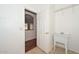 Bright laundry room featuring a utility sink and tile flooring at 2845 N 104Th Ave, Avondale, AZ 85392