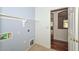 A laundry room with tile floor, a utility sink, and space for appliances at 2845 N 104Th Ave, Avondale, AZ 85392