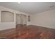Comfortable living space with hardwood floors and neutral wall colors at 2845 N 104Th Ave, Avondale, AZ 85392