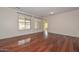 Spacious living room with hardwood floors and plenty of natural light at 2845 N 104Th Ave, Avondale, AZ 85392