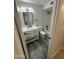 Stylish bathroom showcases a tub with tile surround, modern vanity, and sleek fixtures at 3225 E Monica Ave, Phoenix, AZ 85032