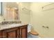 Bathroom with a sink, toilet and granite countertop, and mirror at 3379 E San Pedro Ave, Gilbert, AZ 85234