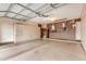 Spacious garage features built in cabinets and epoxy flooring with utility equipment on the back wall at 3379 E San Pedro Ave, Gilbert, AZ 85234