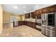 Beautiful kitchen with stainless steel appliances, granite countertops, and custom cabinetry at 3379 E San Pedro Ave, Gilbert, AZ 85234