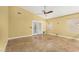 Large, open living space with French doors and tile floors at 3379 E San Pedro Ave, Gilbert, AZ 85234