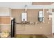 Clean utility room with various equipment including a water filtration system and wall-mounted vacuum at 3379 E San Pedro Ave, Gilbert, AZ 85234
