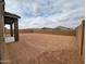Large, open backyard enclosed by block wall, ready for landscaping and creating your ideal outdoor living space at 361 S Calle Miguel --, Casa Grande, AZ 85194