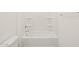 Clean bathroom shows white tile tub and white toilet seat at 361 S Calle Miguel --, Casa Grande, AZ 85194