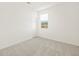 Bright, carpeted bedroom with natural light, neutral walls, and closet at 361 S Calle Miguel --, Casa Grande, AZ 85194