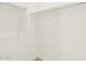 Bright, white walk-in closet with ample storage space with a neutral carpeted floor at 361 S Calle Miguel --, Casa Grande, AZ 85194