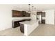 Spacious kitchen with a center island, modern appliances, and ample counter space at 361 S Calle Miguel --, Casa Grande, AZ 85194