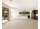 Open-concept kitchen with stainless steel appliances and a large island at 361 S Calle Miguel --, Casa Grande, AZ 85194
