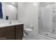 Bright bathroom with a walk-in shower, vanity, and tile flooring at 37103 N El Morro Trl, San Tan Valley, AZ 85140
