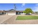 Charming single-story home with manicured lawn, two-car garage, and attractive landscaping at 3904 S Butte Ave, Tempe, AZ 85282