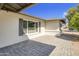 Charming front porch and exterior with a light colored brick and manicured landscaping at 3904 S Butte Ave, Tempe, AZ 85282