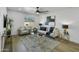 Comfortable living room with stylish furniture, a ceiling fan, and neutral tones at 3904 S Butte Ave, Tempe, AZ 85282