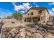 View of backyard and patio showing house exterior at 396 S 166Th Dr, Goodyear, AZ 85338