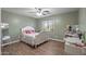 Inviting bedroom featuring a comfortable bed and a vanity at 396 S 166Th Dr, Goodyear, AZ 85338