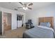 Inviting bedroom featuring a desk and closet at 396 S 166Th Dr, Goodyear, AZ 85338