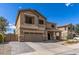 This two-story house offers a two-car garage and stylish design, with a well-kept yard adding to its curb appeal at 396 S 166Th Dr, Goodyear, AZ 85338