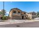 Beautiful two-story home with a spacious two-car garage, complemented by a well-maintained lawn and inviting entrance at 396 S 166Th Dr, Goodyear, AZ 85338