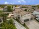 Beautiful neighborhood features a home with spacious backyard, desert landscaping, and inviting curb appeal at 40161 N Westray Way, San Tan Valley, AZ 85140