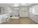 Spacious bedroom featuring plush carpet, neutral walls, and filled with bright natural light from windows at 40161 N Westray Way, San Tan Valley, AZ 85140