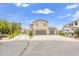 Beautiful two-story home featuring a wide driveway and desert landscaping in a desirable neighborhood at 40161 N Westray Way, San Tan Valley, AZ 85140