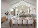 Dining room with a view of the modern open floorplan and sliding glass doors to patio at 42046 N Golden Trl, San Tan Valley, AZ 85140