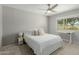 Cozy bedroom with a neutral color scheme, comfortable furnishings, and a view of the neighborhood at 4842 W Christine Cir, Glendale, AZ 85308