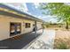 A covered patio provides a shady outdoor space that overlooks the backyard at 4842 W Christine Cir, Glendale, AZ 85308