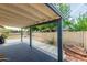 Covered patio featuring string lights, concrete flooring, and a view of the backyard at 4842 W Christine Cir, Glendale, AZ 85308