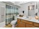 Clean bathroom features a bathtub, a shower, and decorative accents at 542 S Higley Rd # 52, Mesa, AZ 85206