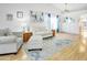 Bright living room with a vaulted ceiling, neutral furniture and a colorful area rug at 542 S Higley Rd # 52, Mesa, AZ 85206