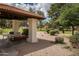 Shaded park structure with swing, table and seating provides the perfect outdoor gathering space at 542 S Higley Rd # 52, Mesa, AZ 85206