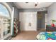 Bedroom with a large window and closet at 5537 W Boca Raton Rd, Glendale, AZ 85306