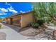 Charming home featuring private mailboxes, mature trees, and low-maintenance landscaping at 5877 N Granite Reef Rd # 2240, Scottsdale, AZ 85250