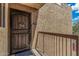 Inviting front entrance with security door, railing, and clear unit number at 5877 N Granite Reef Rd # 2240, Scottsdale, AZ 85250