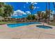 Enjoy the community pool and hot tub, surrounded by lush landscaping and desert sunshine at 5877 N Granite Reef Rd # 2240, Scottsdale, AZ 85250