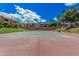 Community tennis court surrounded by lush landscaping and manicured grounds at 5877 N Granite Reef Rd # 2240, Scottsdale, AZ 85250