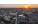 Breathtaking aerial view of desert homes at sunset at 612 N Signal Butte Rd, Mesa, AZ 85207