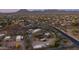 High-angle shot showing properties nestled in the Arizona desert landscape at 612 N Signal Butte Rd, Mesa, AZ 85207