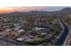 Scenic aerial shot of desert real estate with mountain views at 612 N Signal Butte Rd, Mesa, AZ 85207