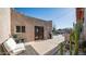 Backyard patio area with grill, Southwestern architecture, and desert landscaping at 612 N Signal Butte Rd, Mesa, AZ 85207