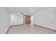 This large bedroom offers tile floors and an entry to another room at 612 N Signal Butte Rd, Mesa, AZ 85207